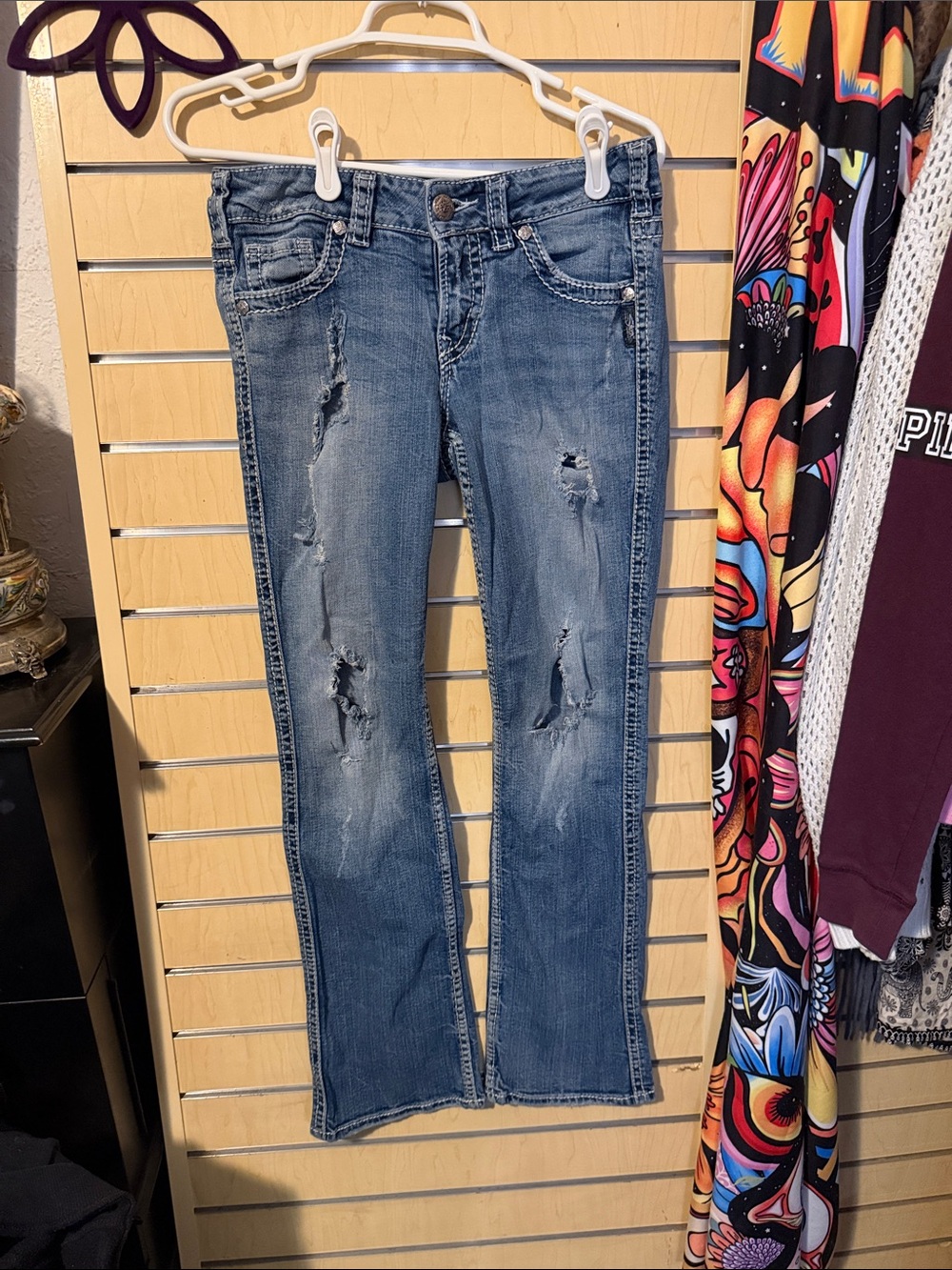 Silver Jeans Distressed Light Blue Boot Cut Jeans